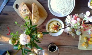 Homemade hummus, homemade queso blanco, Acme olive bread, peonies.