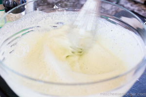 Profiteroles with Matcha Green Tea Vanilla Ice Cream. Whisking matcha and cream together.