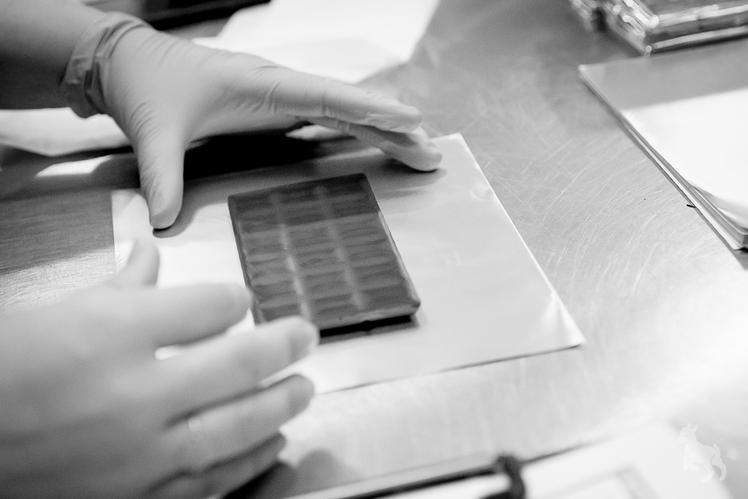 Wrapping the chocolate by hand.