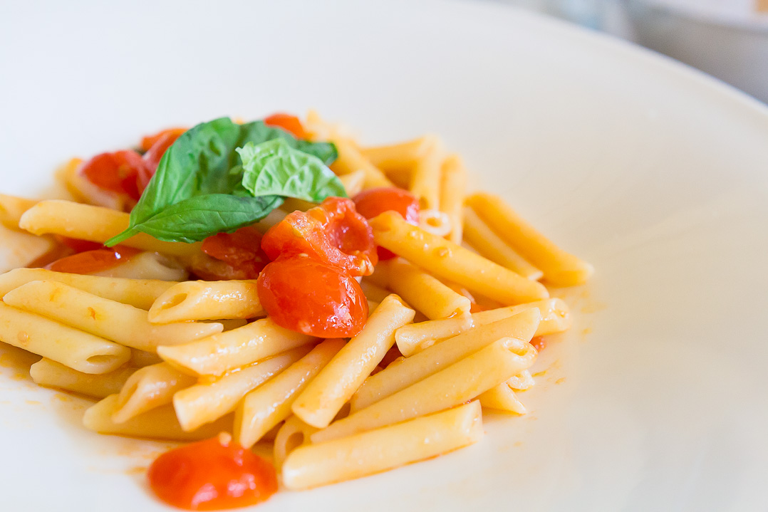 Penne with tomatoes.