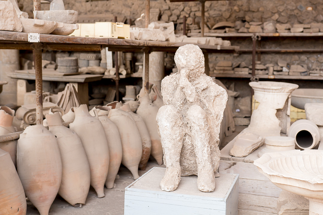 A plaster cast of a man. At Pompeii.