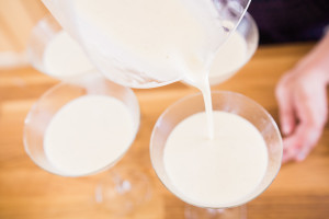 Pouring the panna cotta into molds, or martini glasses in my case! Recipe on misscheesemonger.com.